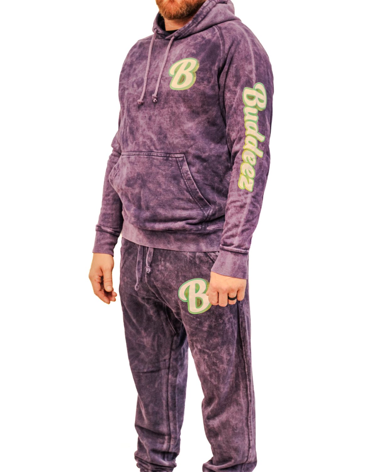 Model wearing the Buddeez Character Hoodie and Mineral Wash Joggers in purple
